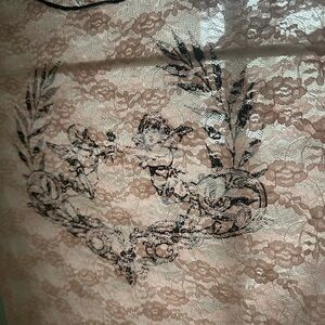 Elegant Lace Top with Black Floral Design